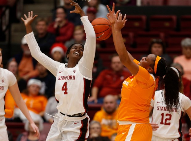 STANFORD, CALIFORNIA - DECEMBER 18: Stanford's Nadia Fingall (4) fights for a rebound against Tennessee's Kasiyahna Kushkituah (11) in the fourth quarter at Maples Pavilion in Stanford, Calif., on Wednesday, Dec. 18, 2019. (Nhat V. Meyer/Bay Area News Group)