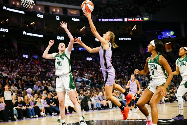 Golden State Valkyries' Miela Sowah (7) takes a shot against Seattle Storm's Grace Vanslooten (40) during a preseason game in the fourth quarter at Chase Center in San Francisco, Calif., on Saturday, April 25, 2026. (Shae Hammond/Bay Area News Group)