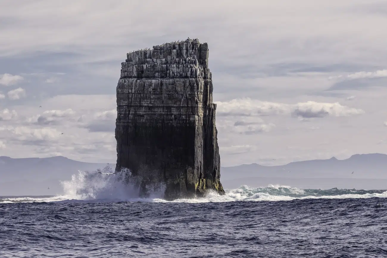 Tower-shaped rock in ocean