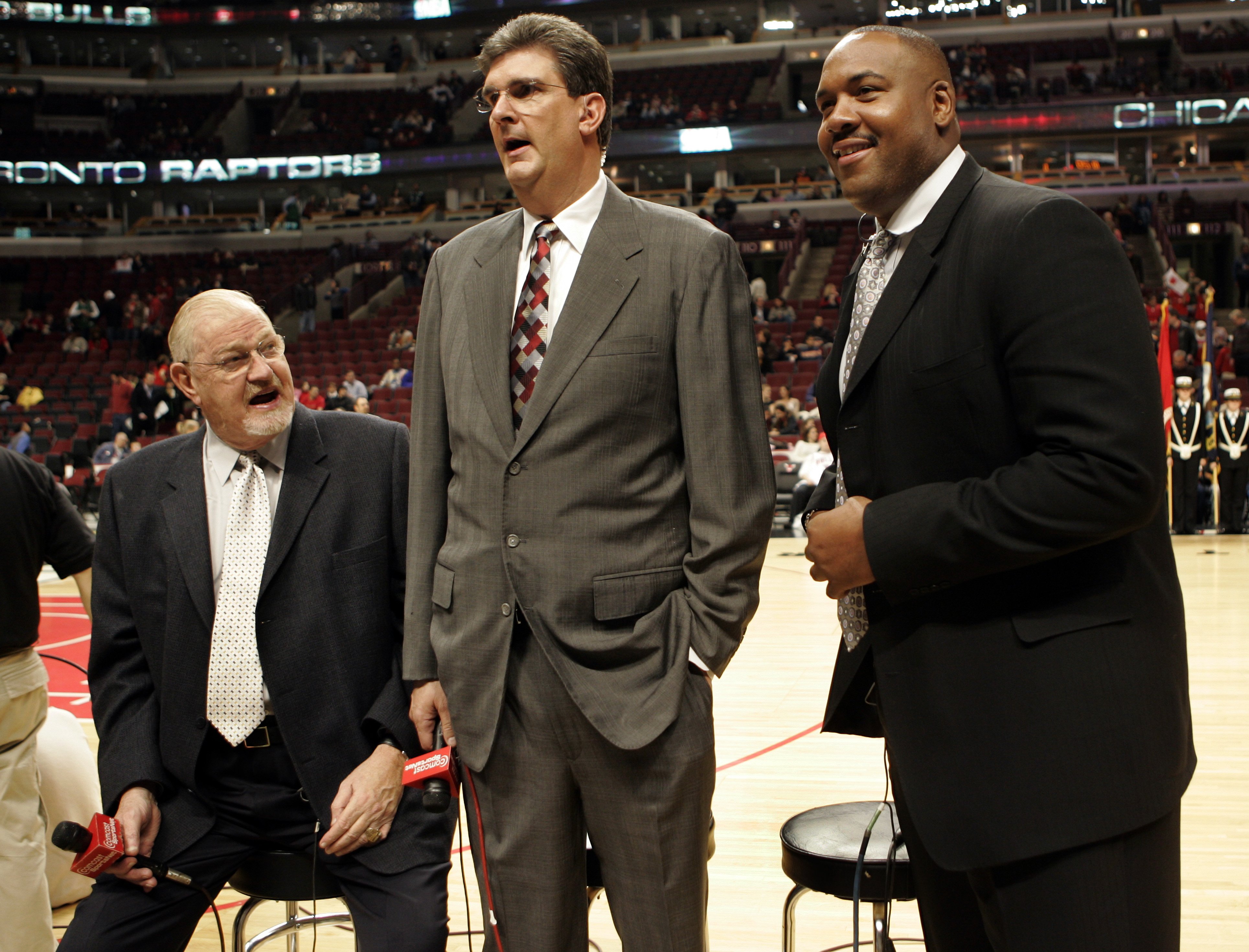 Bulls announcers, from left, Johnny Kerr, Tom Dore, and Stacey...
