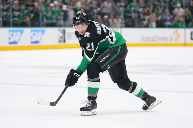 Stars left wing Jason Robertson eyes the puck during the third period in Game 5 of a first-round Stanley Cup playoff series against the Wild on April 28, 2026, in Dallas. (AP Photo/Julio Cortez)
