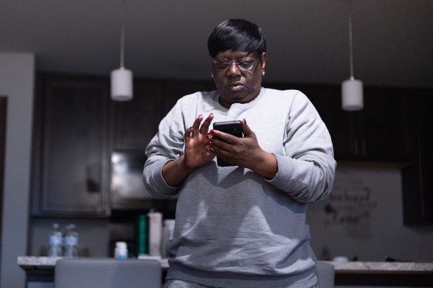 Charmaine Jones, 65, at her home in Waukegan on June 17, 2026. "They saved my life," Jones said. "I'm not changing my hospital. They got me through a lot, and I appreciate that." Jones moved to her current home in Waukegan but continues to take public transportation to Mount Sinai Hospital for all of her healthcare needs. (Josh Boland/Chicago Tribune)