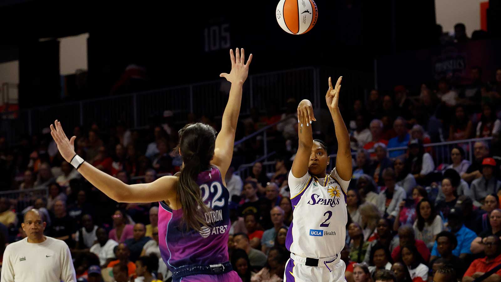 Washington, District of Columbia, USA; Los Angeles Sparks guard Chance Gray (2) shoots the ball over Washington Mystics guard Sonia Citron (22) in the first half at CareFirst Arena.