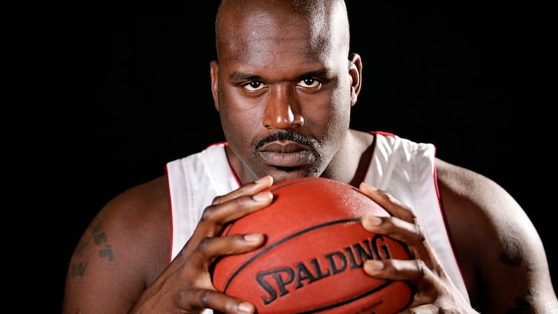 Miami Heat center Shaquille O'Neal poses for a photo on NBA basketball media day in Miami, Florida, October 2, 2006.