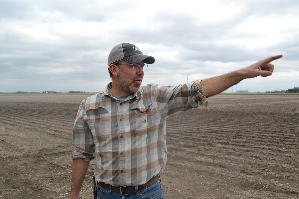 Matthew Bormann, a fifth-generation farmer, is one-third of a trio of growers in Iowa’s flat and fertile Des Moines Lobe. Credit: Anika Jane Beamer/Inside Climate News