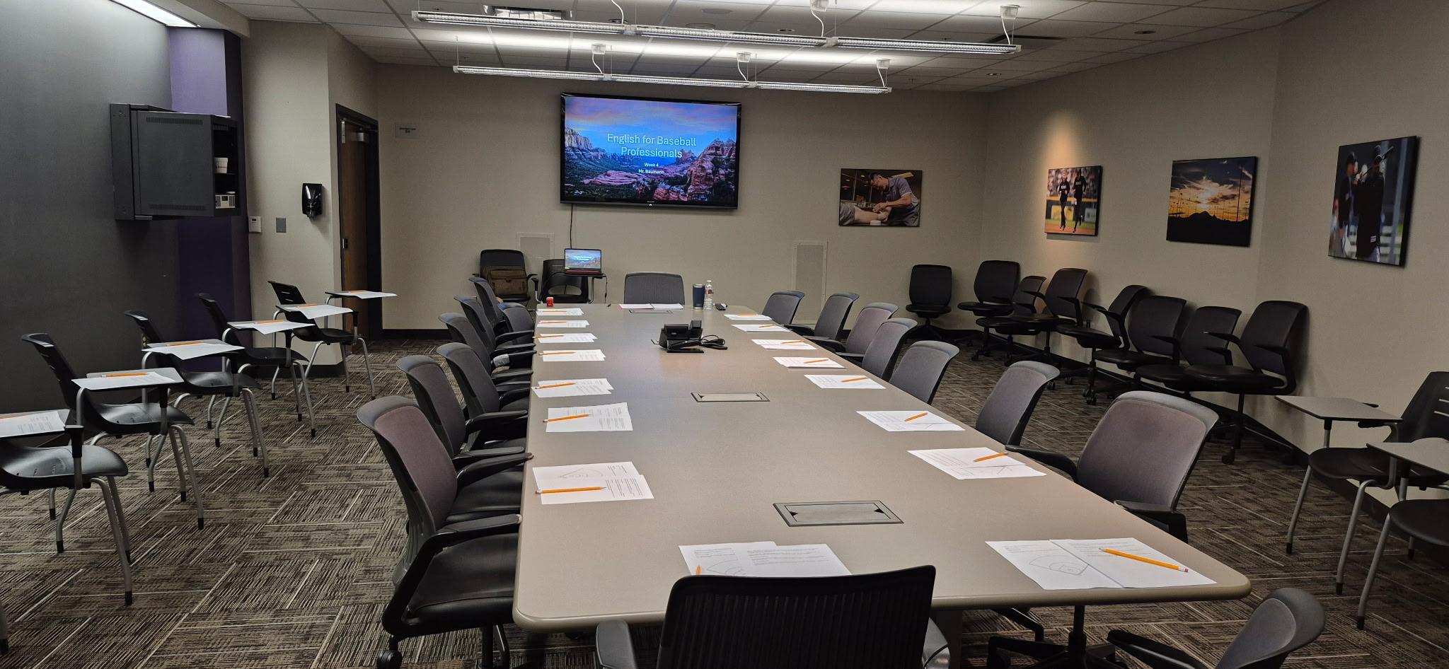 A view of Baumann’s classroom at Salt River Fields at Talking Stick with a table surrounded by chairs. Papers and pencils are on the table.
