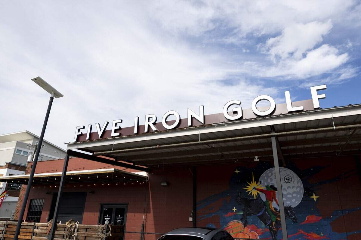 Five Iron Golf celebrates its grand opening at 824 West Daggett Ave. on Thursday, June 11, 2026 in Fort Worth. Five Iron Golf offers golf simulation for beginners and pros, a full-service bar, food menu and other games for entertainment.