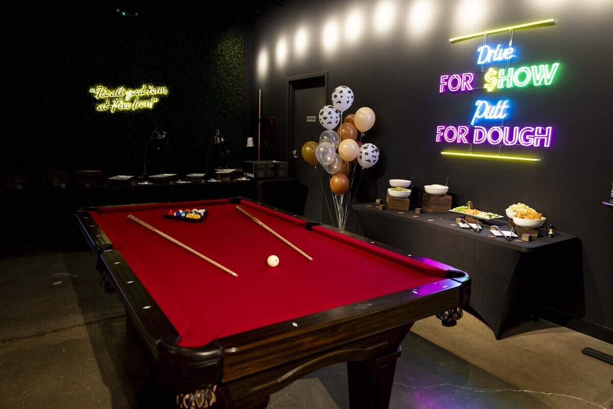 Five Iron Golf has a pool table and darts, along with its golf simulator.