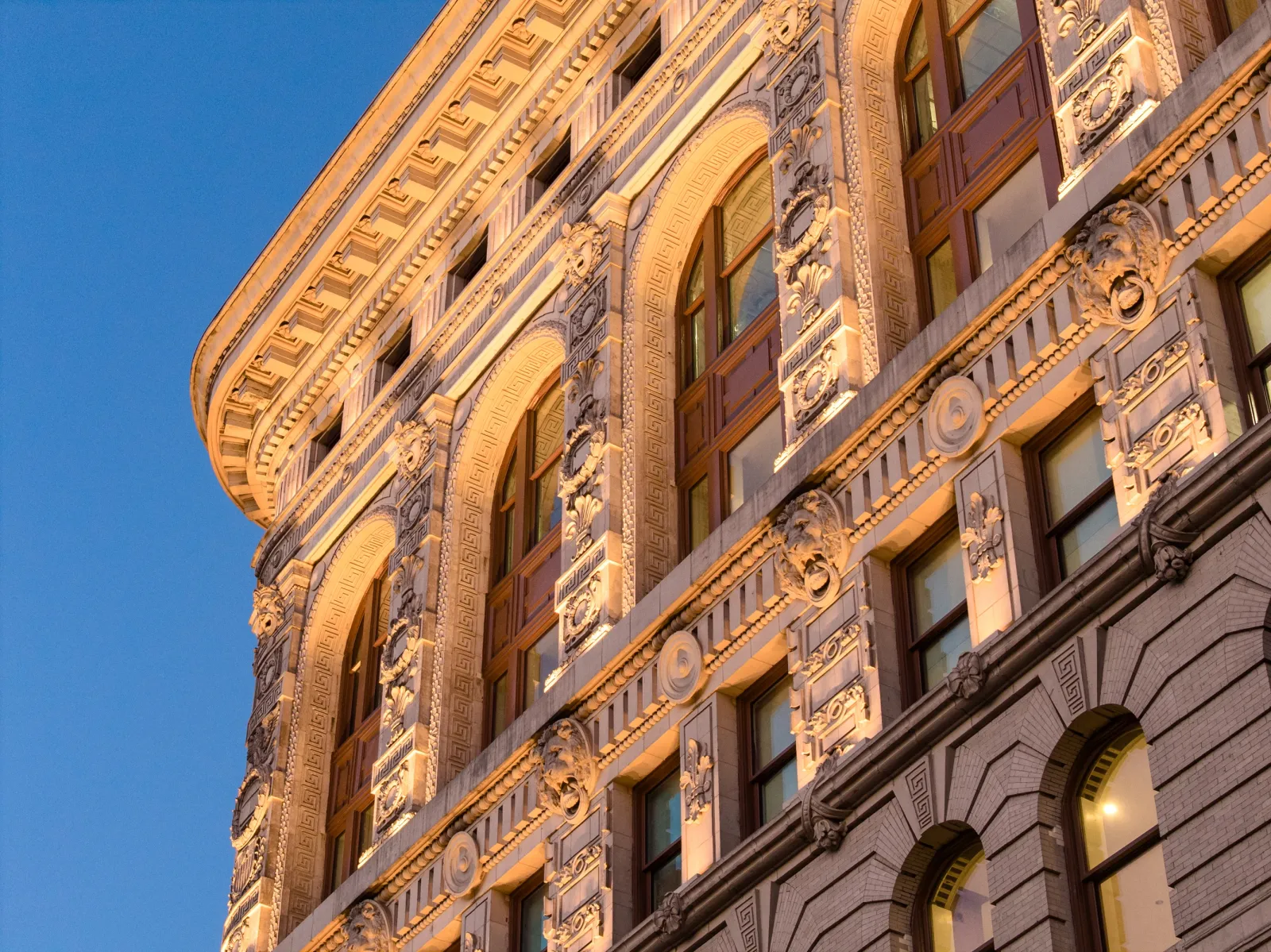 A close-up image of the lit-up façade of the Flatiron Building, shared with Newsweek for the first time.