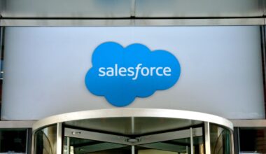 Close-up view of the logo at the entrance to the Salesforce office located at 111 West Illinois Street in Chicago, Illinois, January 2019.