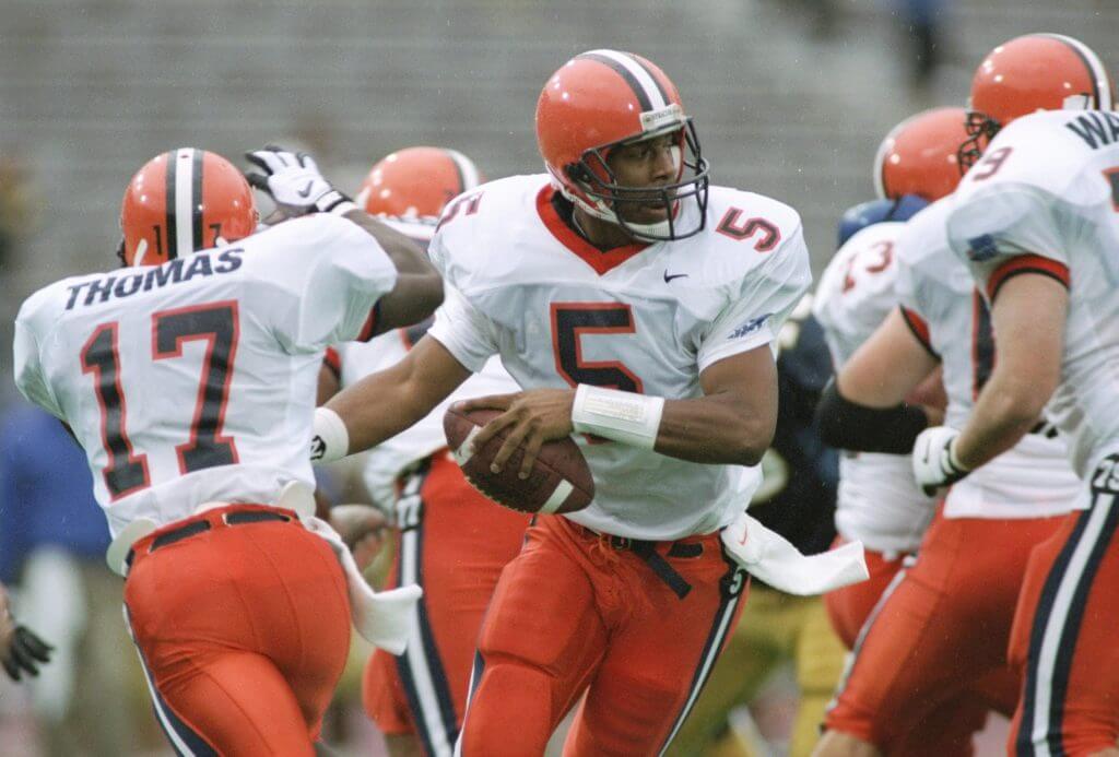 Donovan McNabb holds the football after faking a handoff and rolls to his right