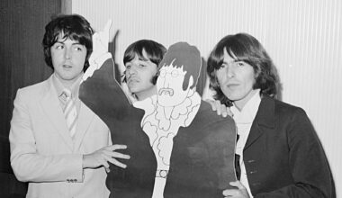 The Beatles Paul McCartney, Ringo Starr and George Harrison with a cardboard cut out of John Lennon from the film Yellow Submarine. July 1968. (Photo by Mirrorpix via Getty Images)