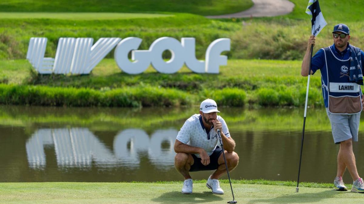 LIV Golf logo on a golf course flag