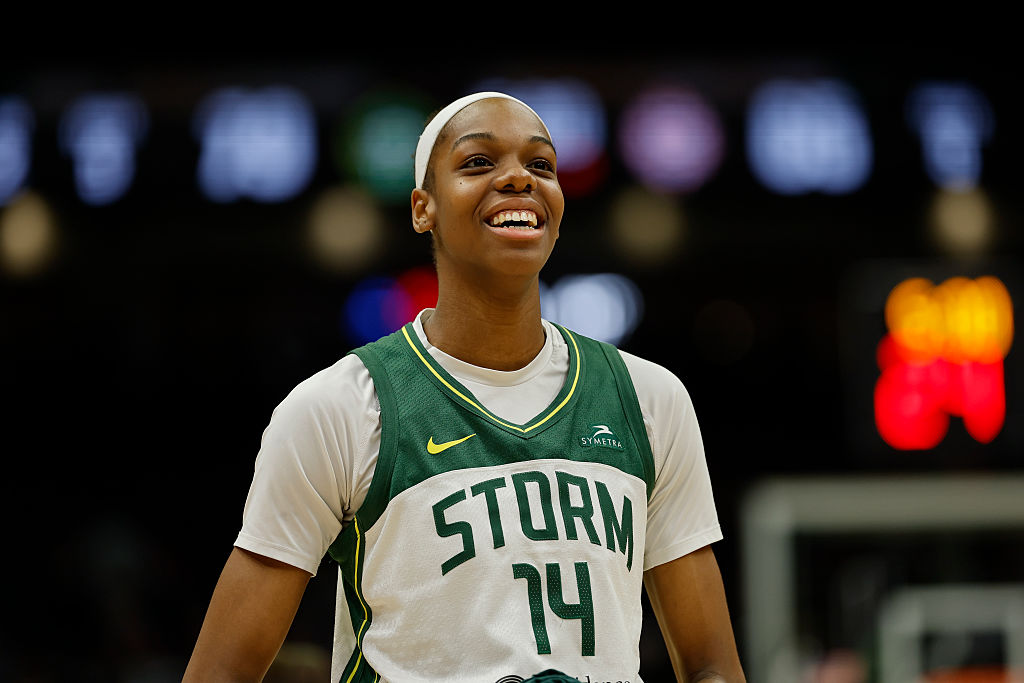 SEATTLE, WASHINGTON - JULY 11: Dominique Malonga #14 of the Seattle Storm smiles against the Connecticut Sun at Climate Pledge Arena on July 11, 2025 in Seattle, Washington. The Seattle Storm won 79-65.