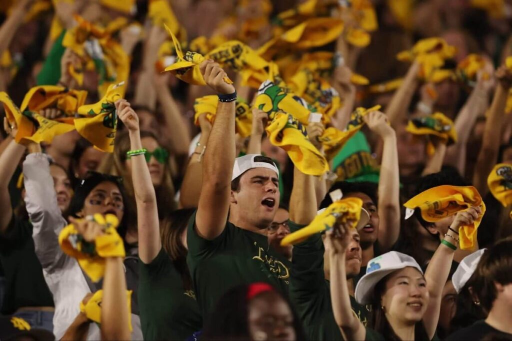 Notre Dame fans cheer and wave towels during the second half of the 2025 football game against Texas A&M.
