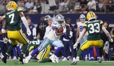 Javonte Williams #33 of the Dallas Cowboys carries the ball against the Green Bay Packers in the game at AT&T Stadium on September 28, 2025 in Arlington, Texas.