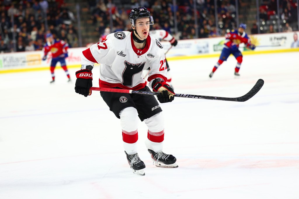 Charlie Morrison #27 of the Quebec Remparts skates after the puck against the Moncton Wildcats during the third period at Avenir Centre on November 16, 2025 in Moncton, Canada.