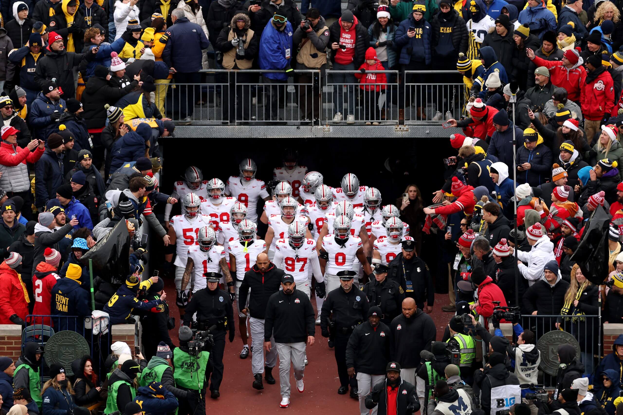 Ryan Day leads Ohio State players out of the tunnel at Michigan