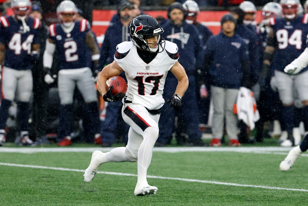 Braxton Berrios #17 of the Houston Texans returns a kick during an AFC Divisional Round game between the New England Patriots and the Houston Texans on January 18, 2026, at Gillette Stadium in Foxborough, Massachusetts. 