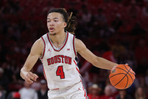 HOUSTON, TEXAS - FEBRUARY 28: Kingston Flemings #4 of the Houston Cougars brings the ball up court against the Colorado Buffaloes during the second half at Fertitta Center on February 28, 2026 in Houston, Texas. (Photo by Alex Slitz/Getty Images)
