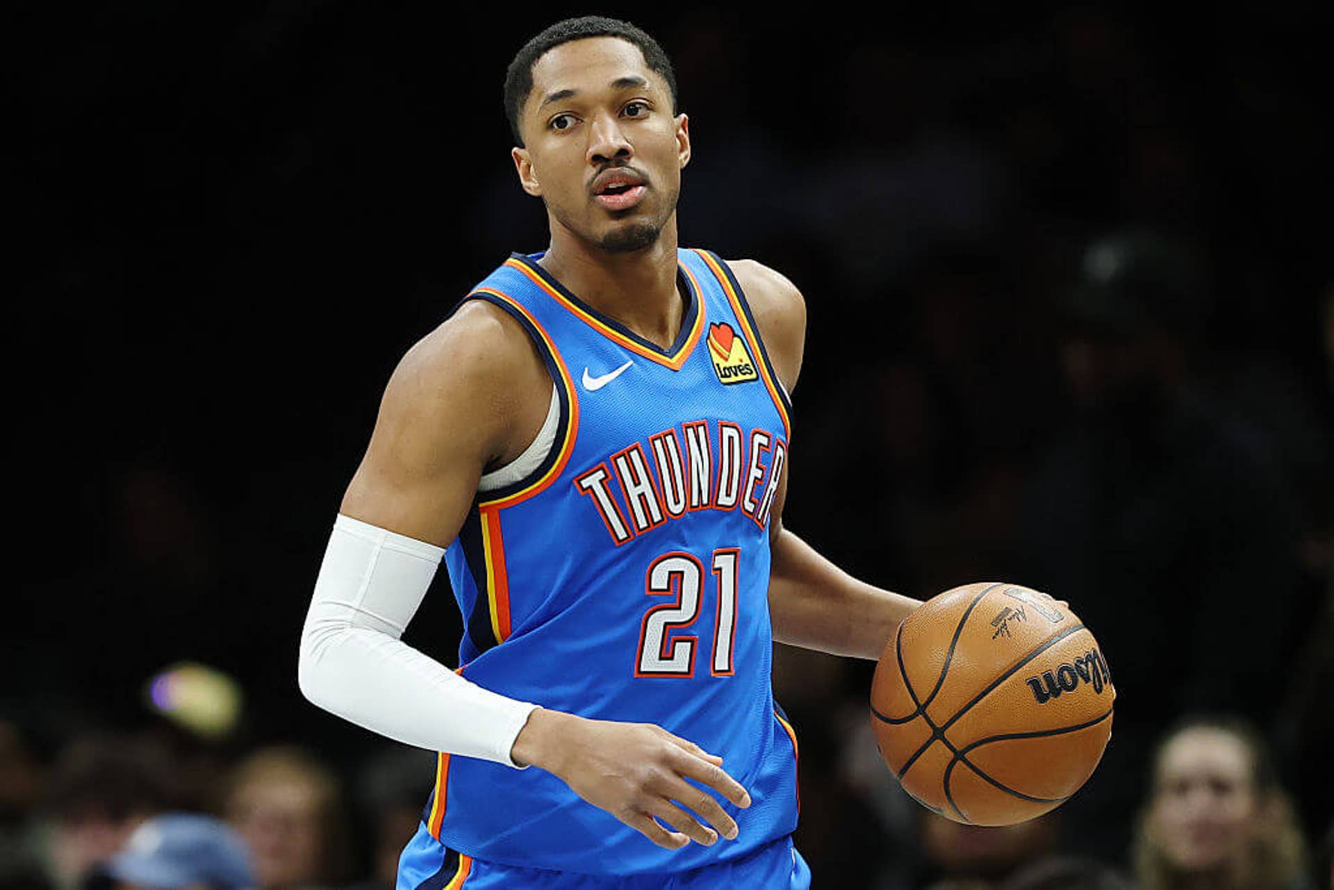 Aaron Wiggins dribbles during a Thunder game.