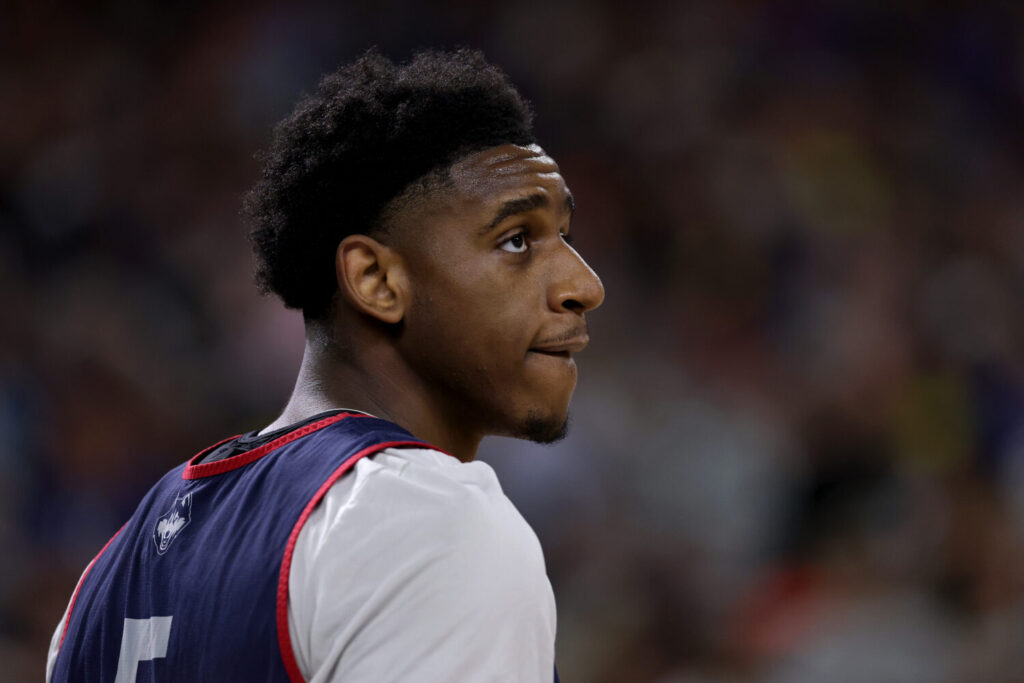 INDIANAPOLIS, INDIANA - APRIL 03: Tarris Reed Jr. #5 of the UConn Huskies looks on during the Practice Day of the 2026 NCAA Men's Basketball Tournament at Lucas Oil Stadium on April 03, 2026 in Indianapolis, Indiana. (Photo by Patrick Smith/Getty Images)