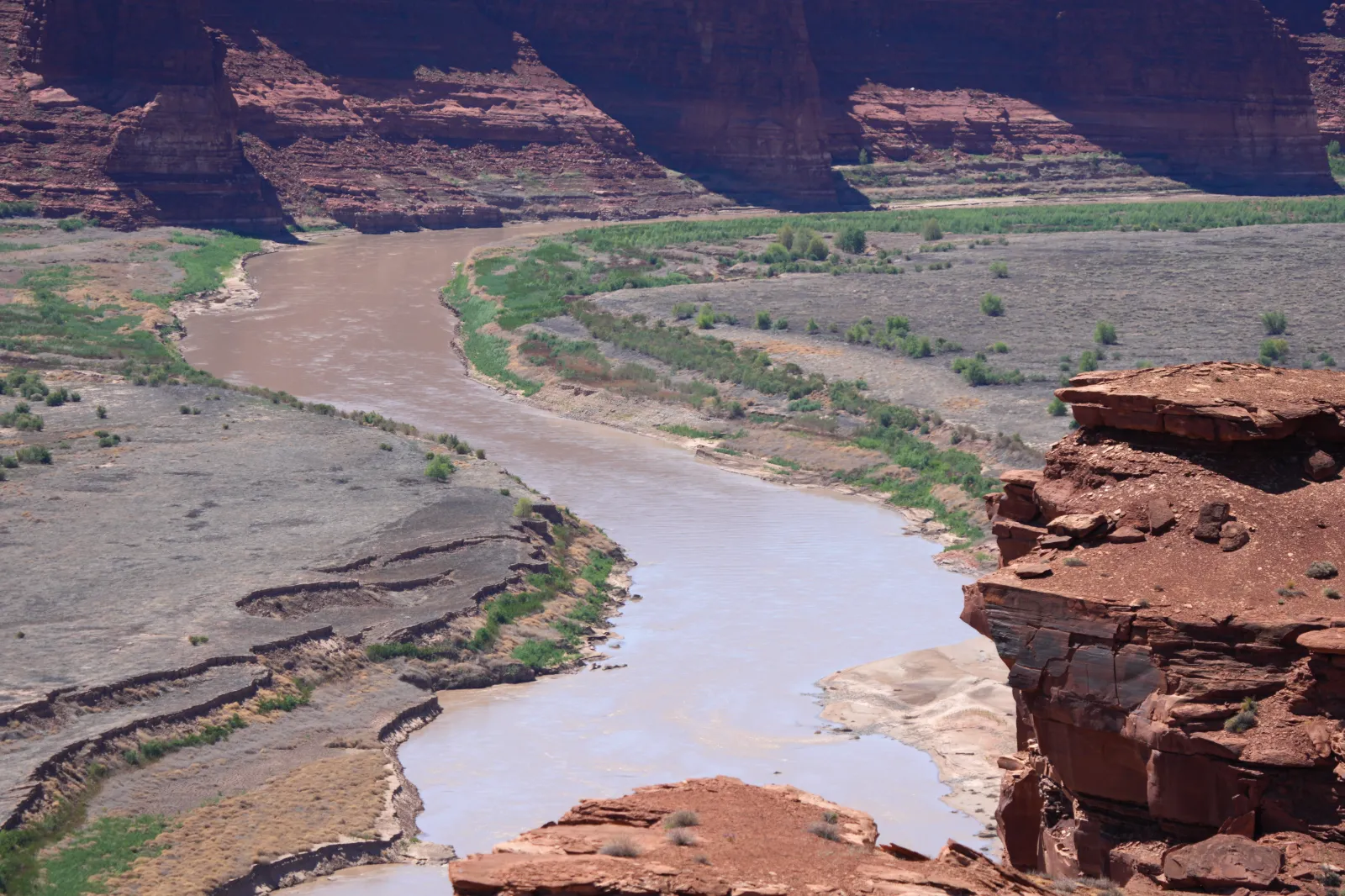 LAKE POWELL, UTAH - APRIL 23: The Colorado River runs through the Hite area of Lake Powell where the water of the lake use to be on April 23, 2026 in Lake Powell, Utah. Due to a long-term western drought and other factors Lake Powell is well below its capacity. (Photo by George Frey/Getty Images)
