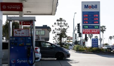 Vehicles sit parked at fuel pumps as regular gasoline prices above $6 per gallon and diesel prices above $7 per gallon are displayed outside a Mobil gas station in Redondo Beach, California on April 30, 2026. (Photo by Patrick T. Fallon/Getty Images)