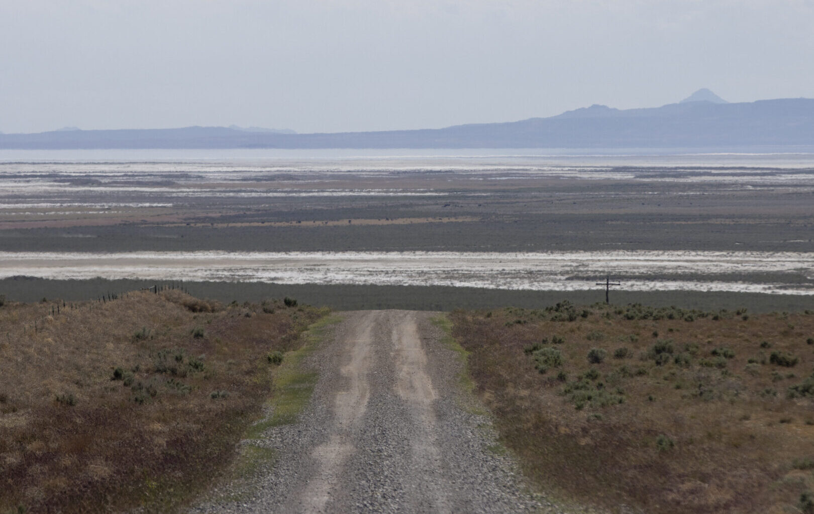 The exposed lake bed of the Great Salt Lake is seen on May 15 from the site where the Stratos Project, a proposed data center, will be built in Utah’s Box Elder County. Supported by celebrity investor Kevin O'Leary, the proposal has met strong opposition from scientists, environmental groups and citizens who fear it could have a potentially devastating impact on wildlife and the water level of the lake.