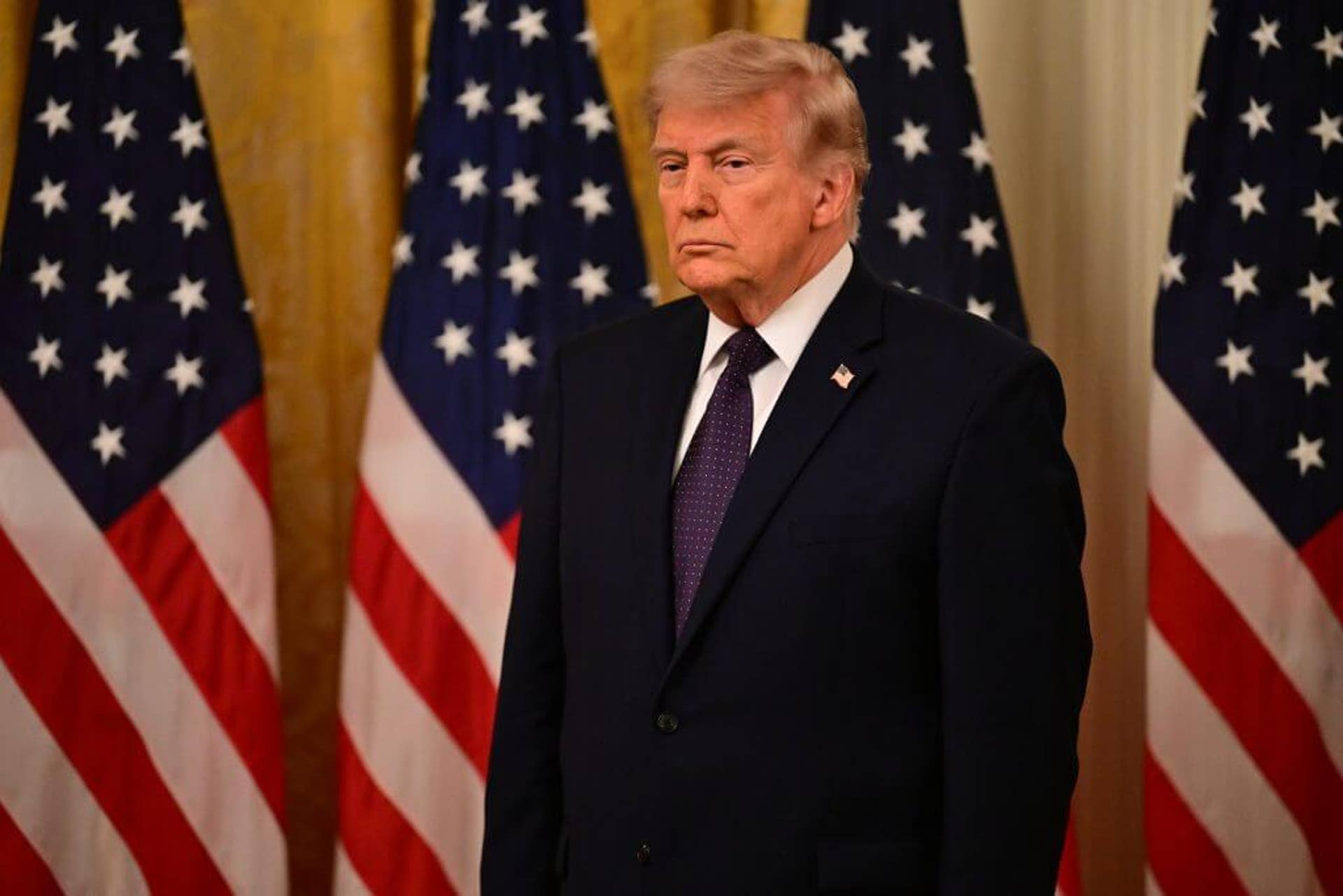 President Donald Trump is shown speaking during the swearing-in ceremony for the new chairman of the Federal Reserve, Kevin Warsh.