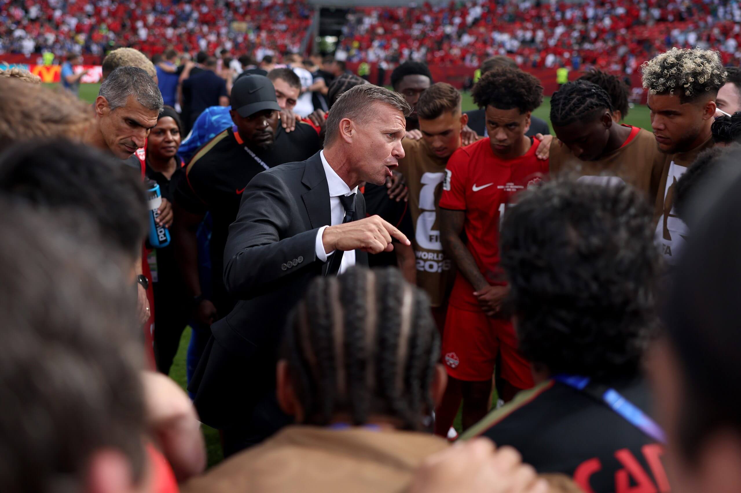 Jesse Marsch gives a team talk in Canada's World Cup opener