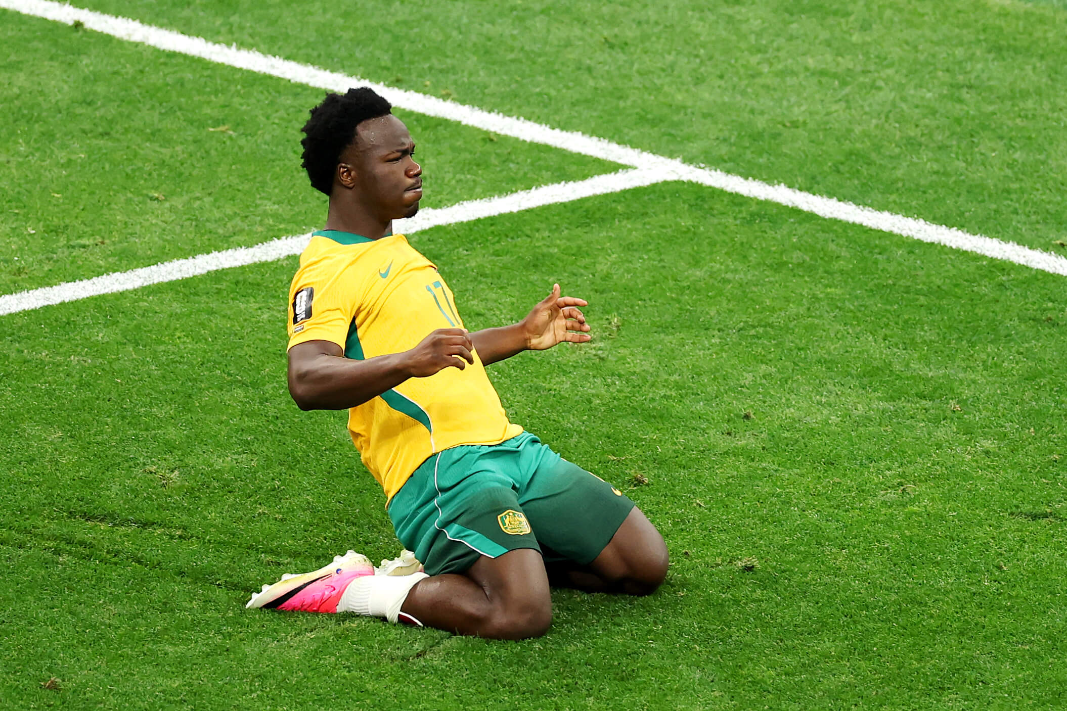 Nestory Irankunda celebrates his opener for Australia against Turkey