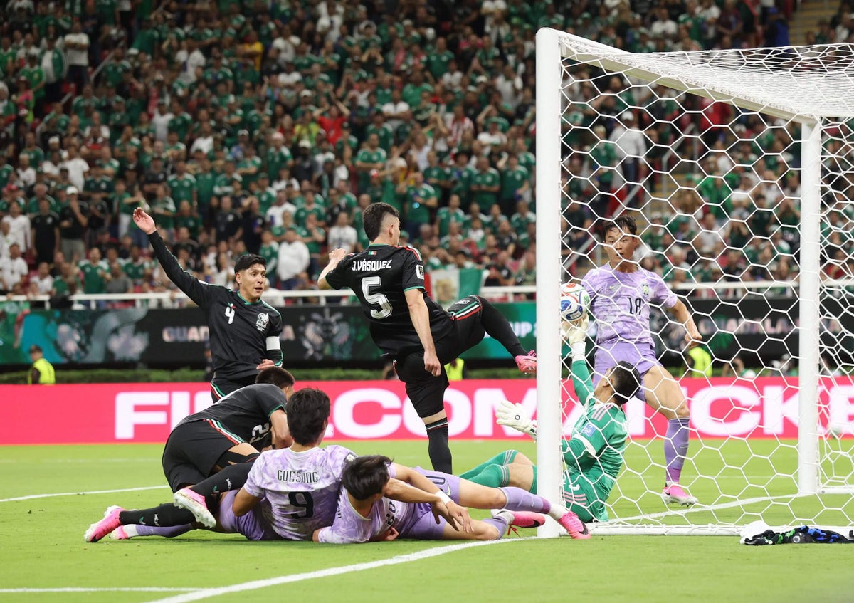 Mexico win World Cup Group A to become first team to qualify for knockout stage