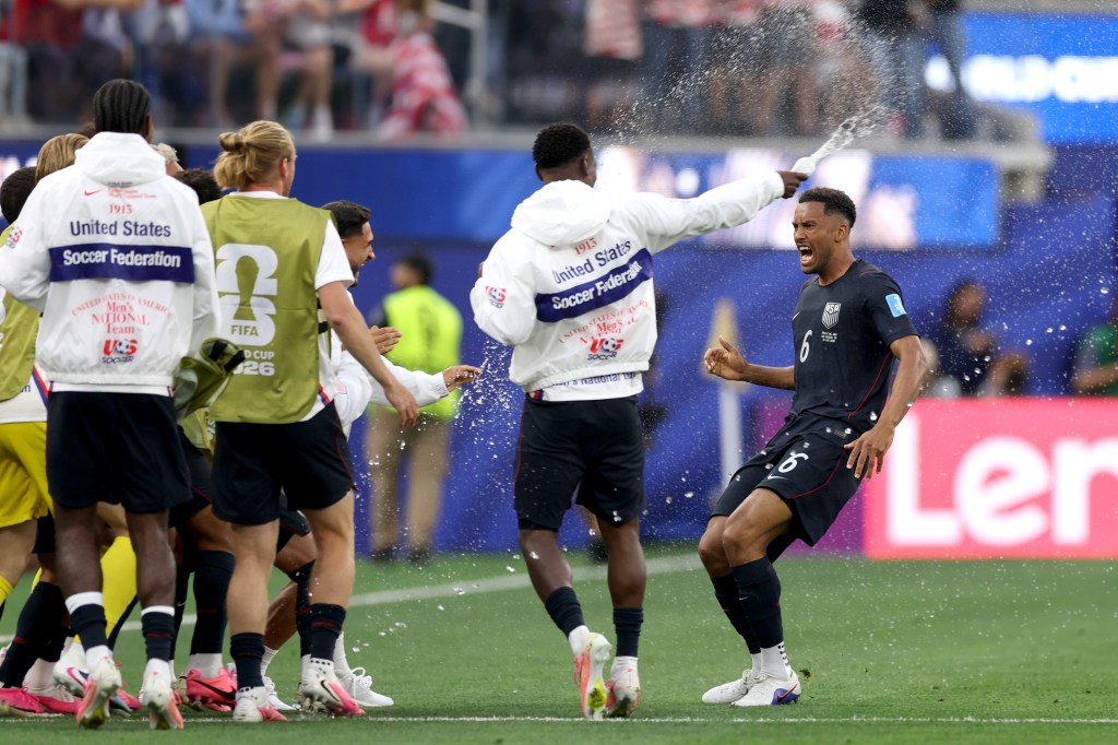 Auston Trusty #6 of the United States celebrates with teammates after scoring his team's first goal during the FIFA World Cup 2026 Group D match between Türkiye and USA at Los Angeles Stadium on June 25, 2026 in Inglewood, California. 