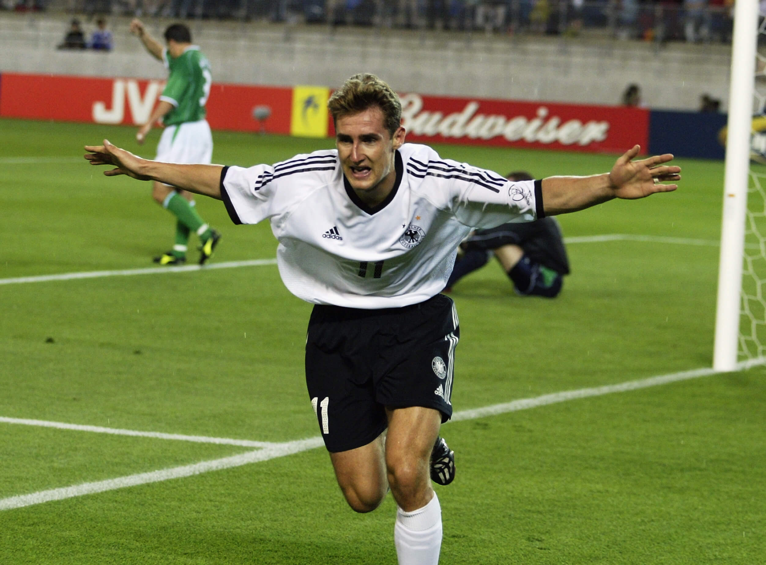 Miroslav Klose of Germany celebrates after scoring the first goal against the Republic of Ireland