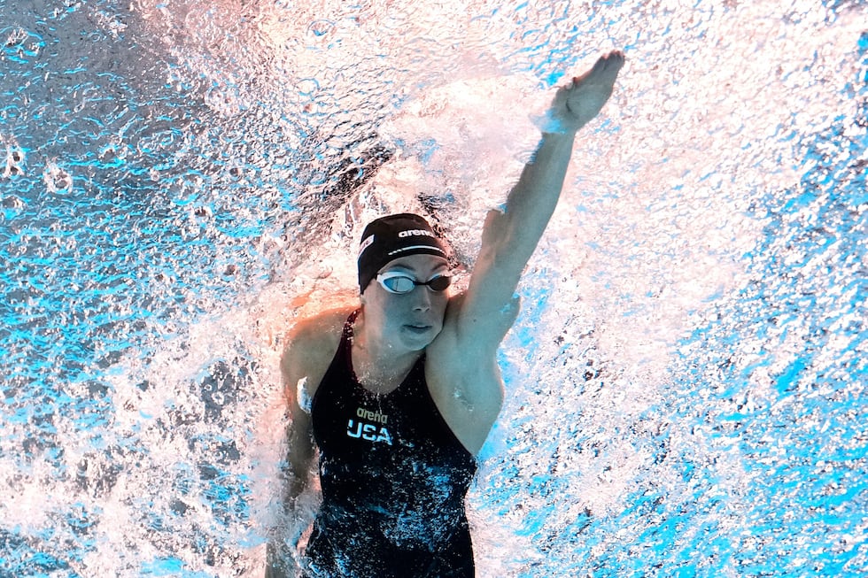 FILE - Gretchen Walsh, of the United States, competes in the women's 50-meter freestyle final...