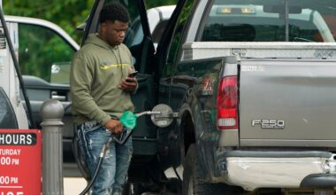 FILE - A customer prepares to pump diesel fuel at this Madison, Miss., Sam's Club, on May 24, 2022.