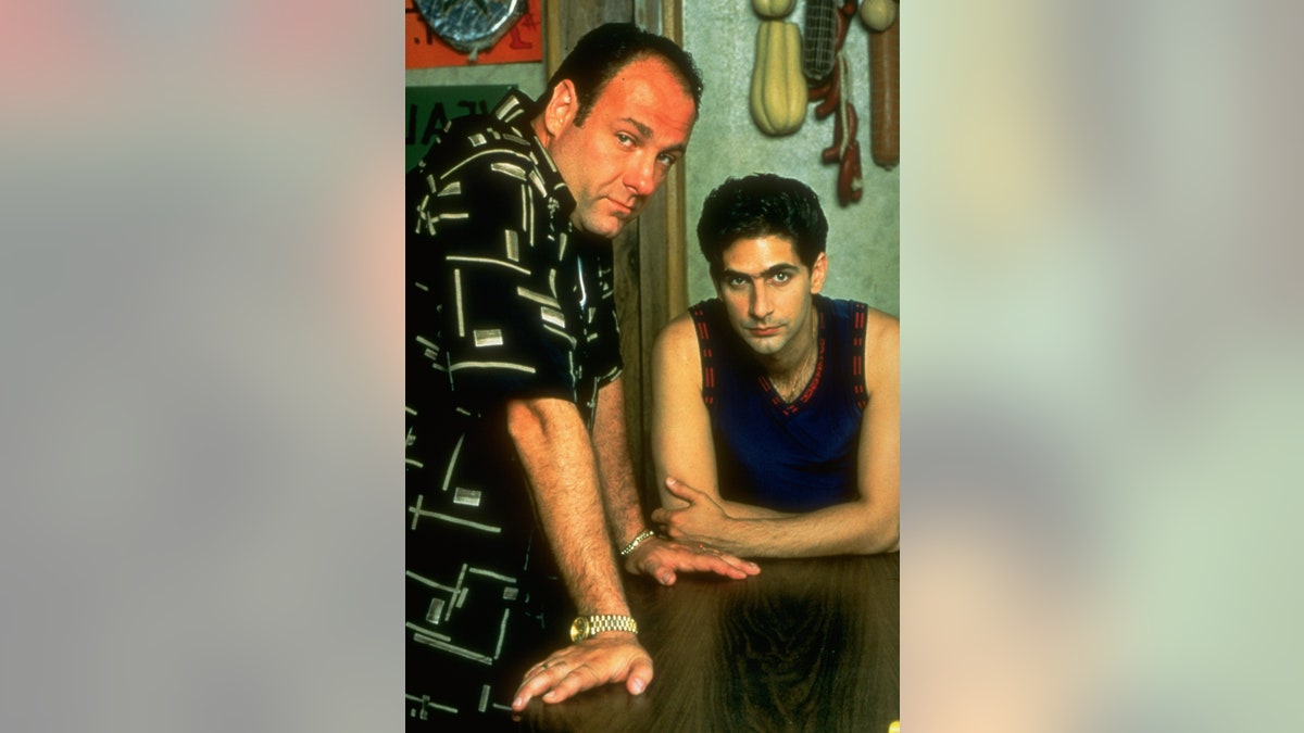 Actors James Gandolfini and Michael Imperioli standing in a scene from The Sopranos