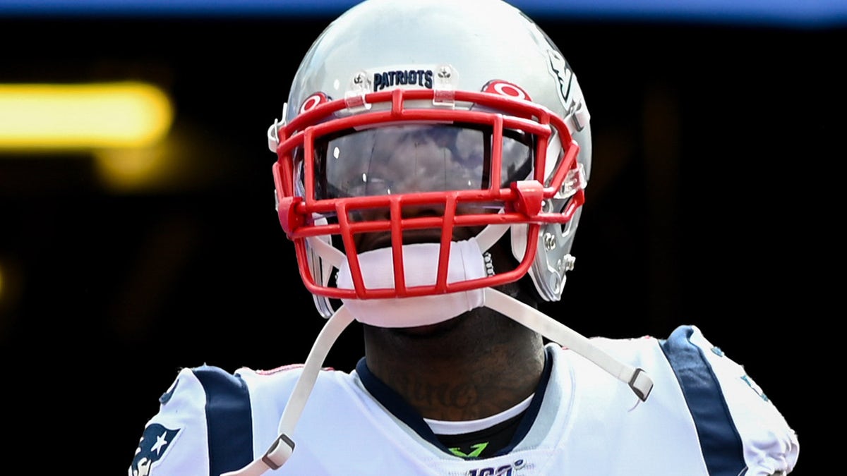 New England Patriots wide receiver Josh Gordon entering the field at New Era Field.