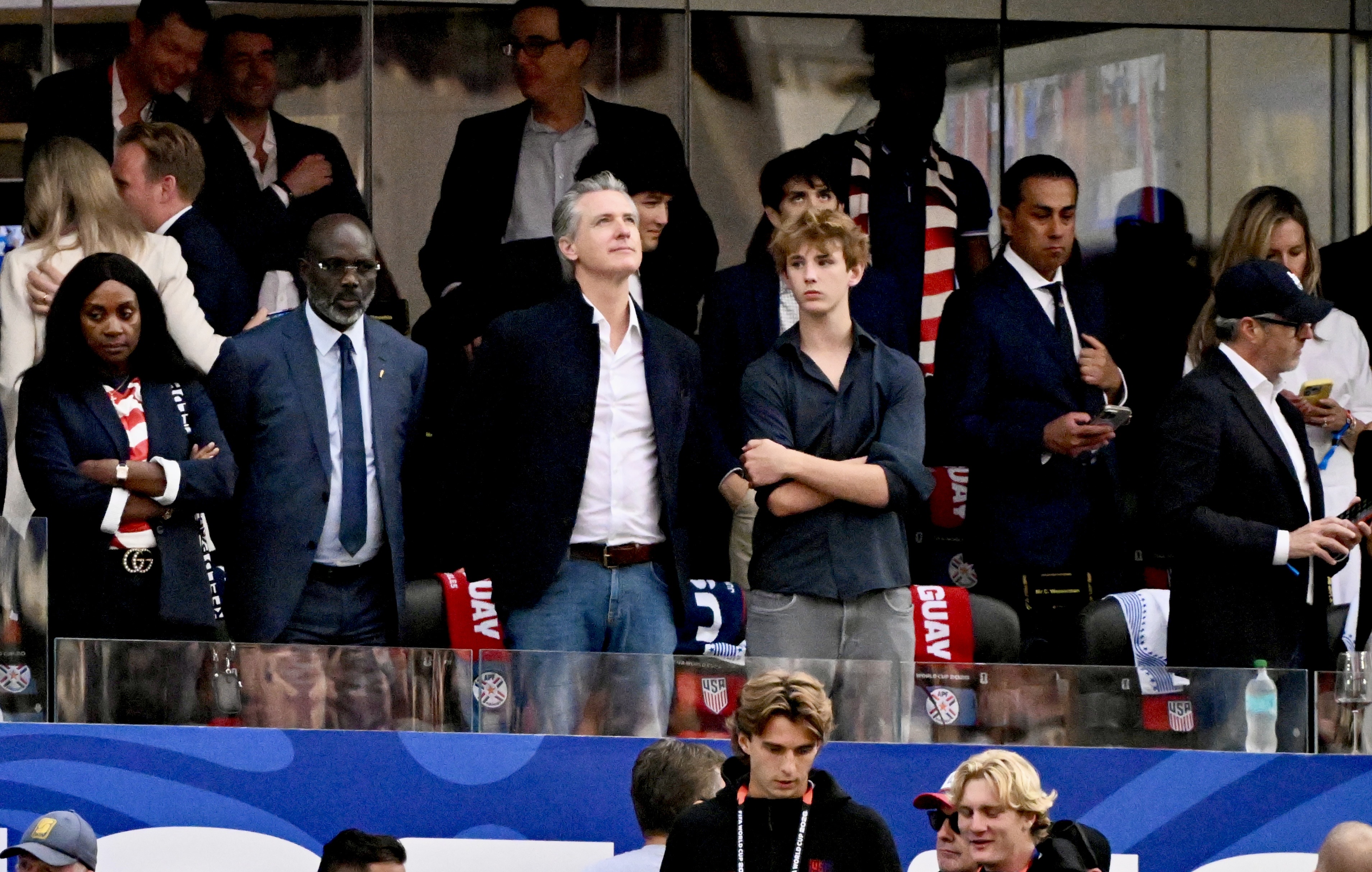 California Governor Gavin Newsom, center, looks on before a 2026...