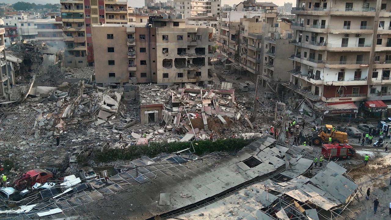 Rescuers work at the site of an Israeli airstrike that hit a building and damaged a hospital in the southern port city of Tyre, Lebanon, Monday, June 1, 2026. (AP Photo)