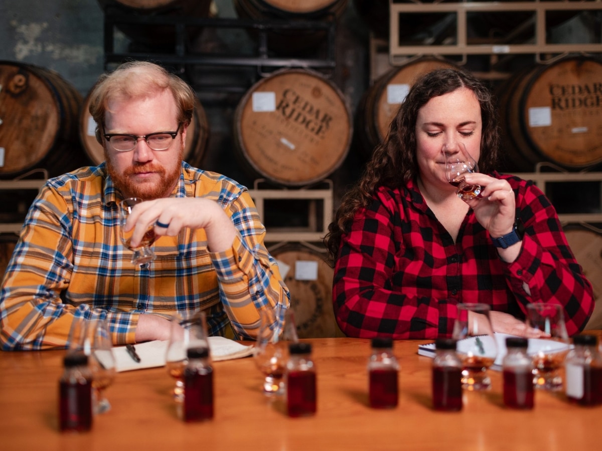 Lost lantern co founders nora ganley roper and adam polonski testing whiskies from all 50 us states for their united states of bourbon collection