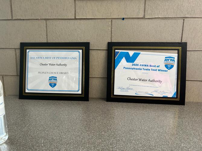 Two framed 2026 “Best of Pennsylvania” taste test awards from the American Water Works Association, on display at the Chester Water Authority’s treatment plant in Lancaster County.