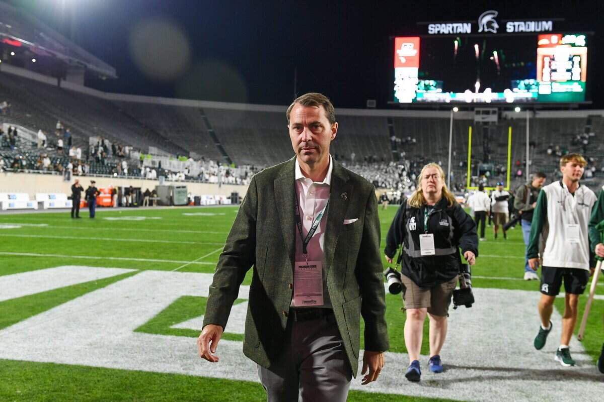 Michigan State athletics director J Batt walks off the field after a college football game against Western Michigan at Spartan Stadium in East Lansing, Michigan, on Aug. 29, 2025. According to reports Saturday, Batt is the leading candidate for the AD position at Kentucky.