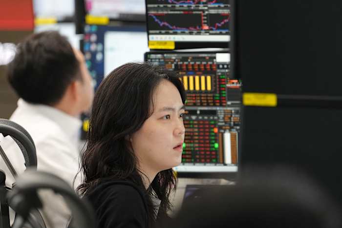 Asian shares retreat as US stocks halt their record-breaking rally, while oil prices fall back