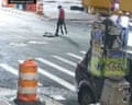 People emerge from New York City manhole