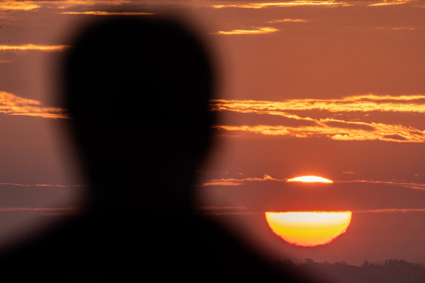 The sun rises on the longest day of the year, the summer solstice, in 2025.