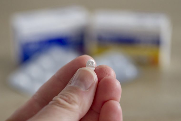 This photograph taken in Terville, northeastern France on April 13, 2026 shows a person holding a tablet of Escitalopram 15 mg manufactured by Arrow Lab, the French subsidiary of Indian pharmaceutical group Aurobindo Pharma. Escitalopram, marketed under brand names including Lexapro, Cipralex, Sipralexa and Seroplex, is an antidepressant belonging to the class of selective serotonin reuptake inhibitors (SSRIs), used to treat depression and anxiety. (Photo by Jean-Christophe VERHAEGEN / AFP via Getty Images)