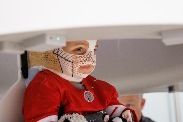 Patient Stephen De La Torre, 7, stays still before a CT scan prior to receiving a proton cancer treatment at Stanford Medicine Cancer Center in Palo Alto, Calif., on June 10, 2026. (Dai Sugano/Bay Area News Group)