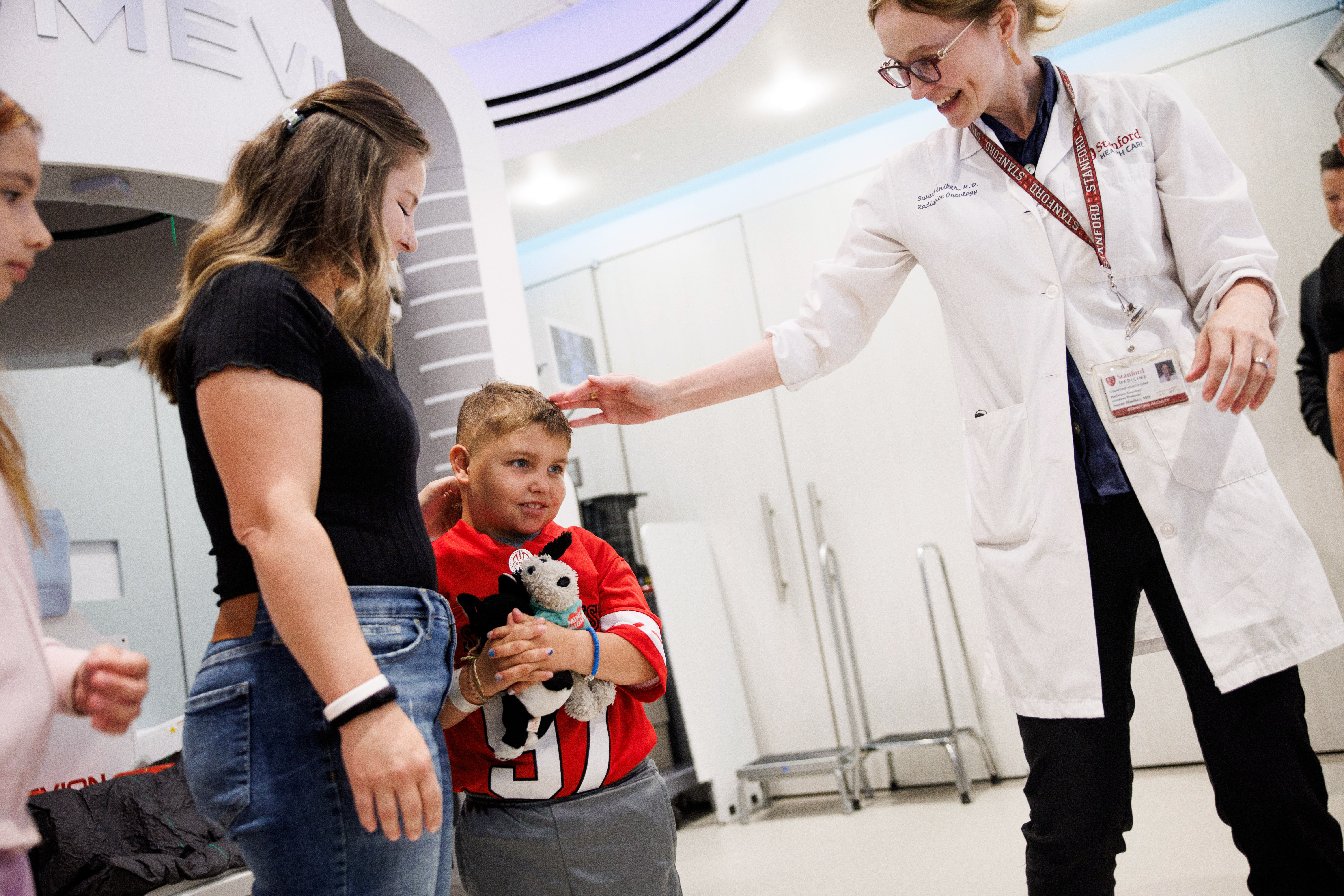 Stanford Medicine radiation oncologist Dr. Susan Hiniker, right, talks to...